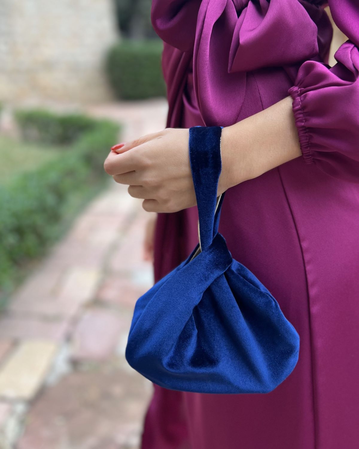 Navy velvet handbag