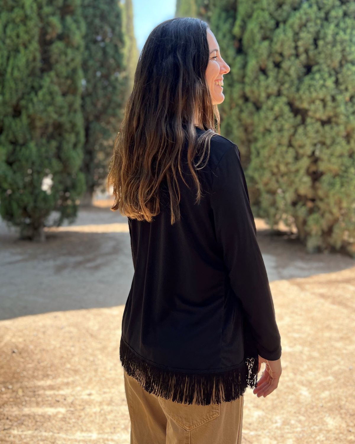 Packable black fringed jacket