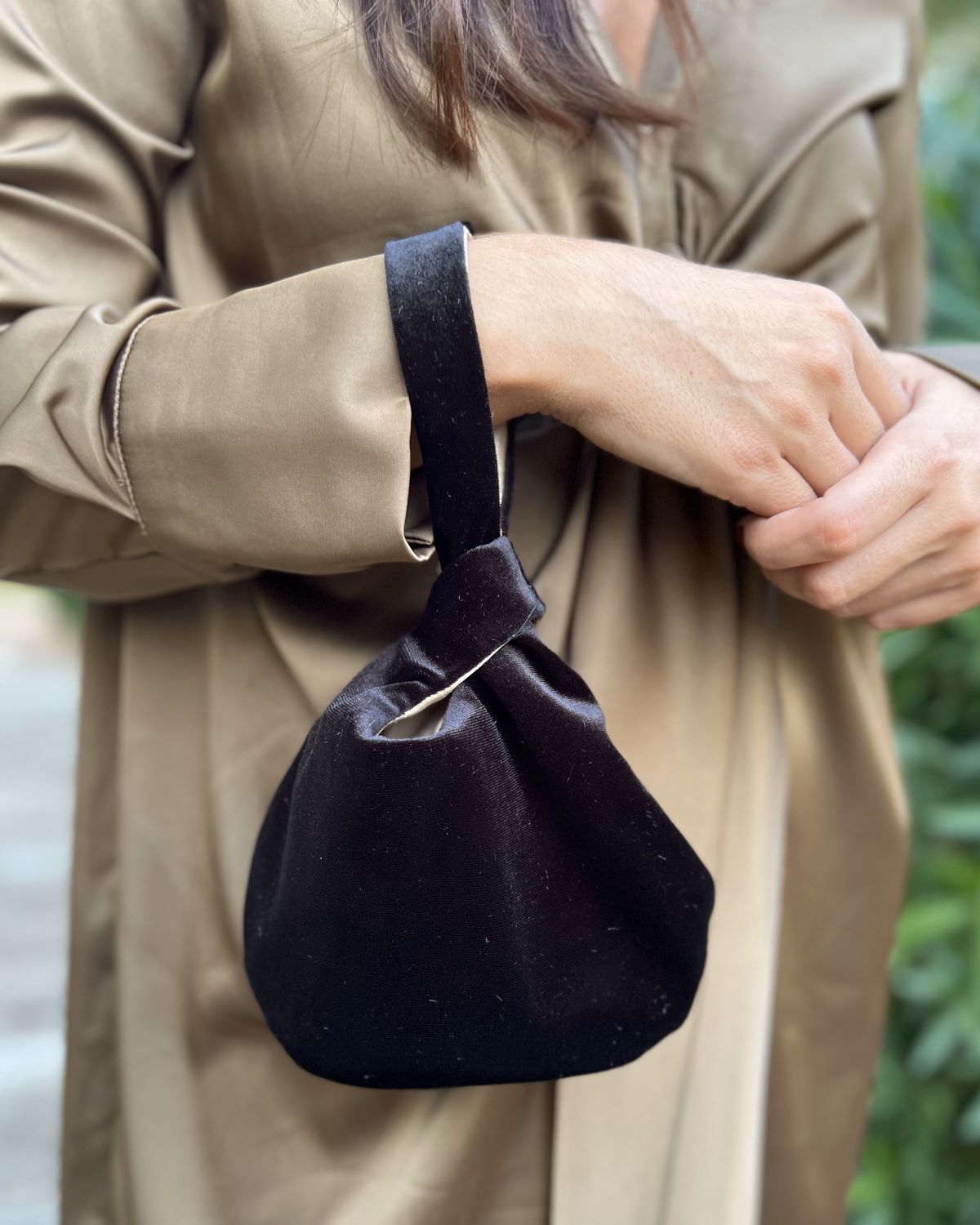 Black velvet handbag